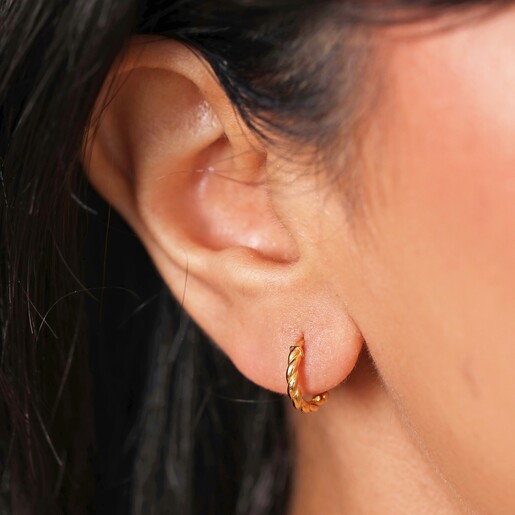Model Shot of Huggies Rope Huggie Earrings in Gold on Model