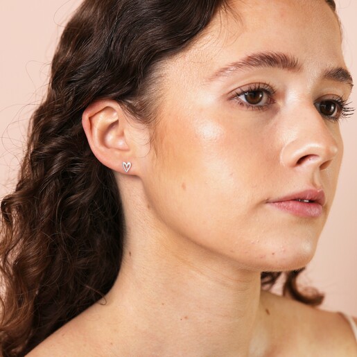 Model Shot Model Shot of Sterling Silver Heart Outline Stud Earrings in Silver