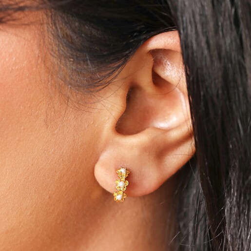 Model Shot Model Shot of Sterling Silver Pearl Flower Huggie Hoop Earrings in Gold