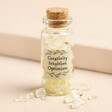 Small Glass Bottle Filled With Tiny Yellow Crystals And A Cork Stopper, With Creativity, Intuition, Optimism Label