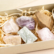 Close up of the colourful stones from inside the cardboard box