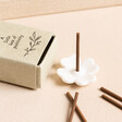 East of India Little Box of Positivity Matchbox on a beige background