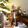 Resin Gingerbread House Stopper in Wine Bottle From Afar