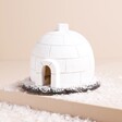 A christmas igloo themed incense burner with an open door and chimney for smoke