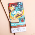 Gnaw New York Cheesecake Milk Chocolate Bar on a Beige Background