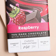 Close Up of Gnaw Raspberry Crisp Dark Chocolate Bar Packagaing