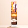 Gnaw Seville Orange Hot Chocolate Spoon with Marshmallows on a Beige Background 