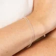 Close Up of Double Layer Chain Bracelet in Silver on Model