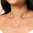 Close Up Model Shot of Horizontal Bar Necklace in Rose Gold