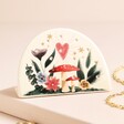 Floral Heart Earring Holder on a Beige Background