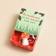 Tiny Matchbox Ceramic Mushroom Token on Beige Background