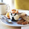 Ceramic Badger Egg Cup on plate with breakfast foods