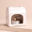 Mini Rustic House Tealight Holder from the back showing tealight candle inside