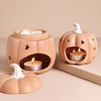 Pair of Pumpkin Starry Ceramic Wax Burners on a neutral backdrop