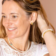 Lisa Angel Wearing Small 20th Anniversary Pearl Charm Bracelet With Matching Necklace