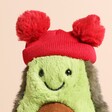 Close Up of Jellycat Amusables Bobble Avocado Soft Toy on a neutral background close up