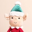 Jellycat Eldo Elf Soft Toy close up with a green christmas hat and bobble