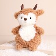 Jellycat Little Reindeer Soft Toy with antlers on a beige background