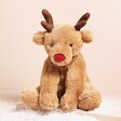 Jellycat Romi Reindeer Soft Toy on a neutral background with antlers and a red nose