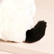 Close up of Jellycat Small Bashful Black & Cream Puppy Soft Toy tail