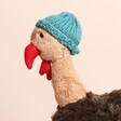 Jellycat Theo Turkey Soft Toy on a neutral background