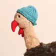 Jellycat Theo Turkey Soft Toy on a neutral background