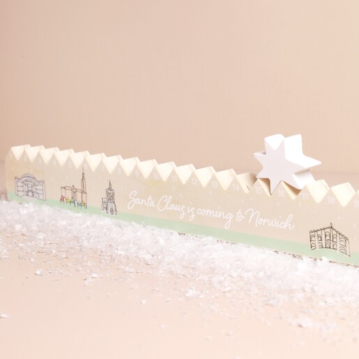 Wooden Norwich Christmas Countdown on a Beige Background.