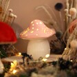 Ceramic LED Pink and White Toadstool Light with a woodland background