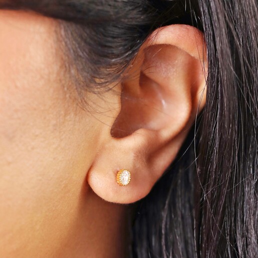 Model shot Crystal Ridge Centre Studs in Gold