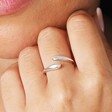 Close Up of Adjustable Sterling Silver Teardrop Wrap Ring in Silver on Model