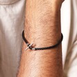 Close Up of Personalised Men's Braided Vegan Leather T-Bar Bracelet in Black on Model