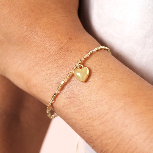 Close Up of Neutral Cord Heart Charm Bracelet in Gold