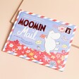 Moomin Mail: Real Letters to Open and Read Book on a neutral background