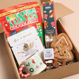 Build Your Own Christmas Hamper for Kids open with gifts inside