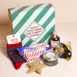 Christmas Build Your Own Gift Hamper with contents on top of hamper box in front of beige backdrop