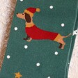 Close Up of Dark Green Festive Sausage Dog Socks