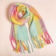 Pastel Check Winter Scarf on a Beige Background