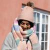 Model Wearing Pink Cable Knit Pom Pom Bobble Hat With Pink and Blue Stripe Scarf