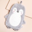 Siku Penguin Hot Water Bottle on a neutral background