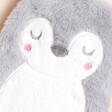 Close Up of Siku Penguin Hot Water Bottle with rosy cheeky and closed eyes