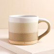 Sass & Belle Oatmeal Marlowe Mug Against Beige Background