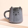 Sass & Belle Mojave Cat Mug against beige backgrounf