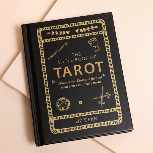 The Little Book of Tarot A black and gold pocket sized book offering tarot guidance on readings