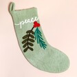 Peace Stocking in Green on a Beige Background