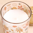 Close up of Autumnal Leaves and Pumpkins Warm Vanilla Candle