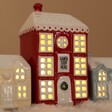 Close up of Set Of 3 Ceramic LED Light Up Houses