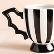 Close Up of Black and White Striped Bat Wing Teacup