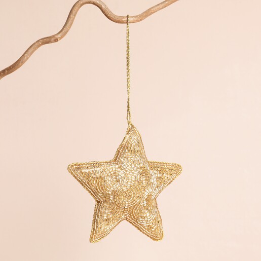 Beaded Star Hanging Decoration Beaded Star Hanging Decoration on a beige background