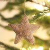 Beaded Star Hanging Decoration on a close up with tree and fairy lights