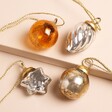 Set of 4 Boxed Mini Baubles with a cracked orange bauble, silver tapered bauble, silver star and mottled gold and silver round bauble